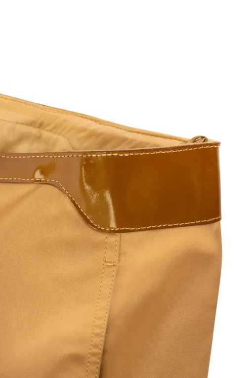 Brown pants with patent leather waistline