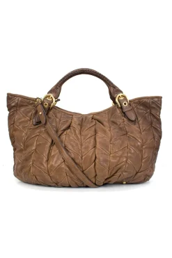 Brown quilted leather top handle bag