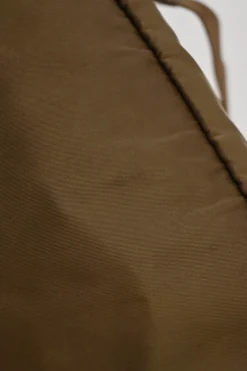 Brown Re-nylon and leather twill rucksack backpack with metal and enamel logo plaque appliqué