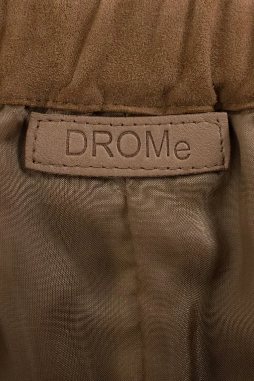 Brown suede tapered pants with elastic waist band.