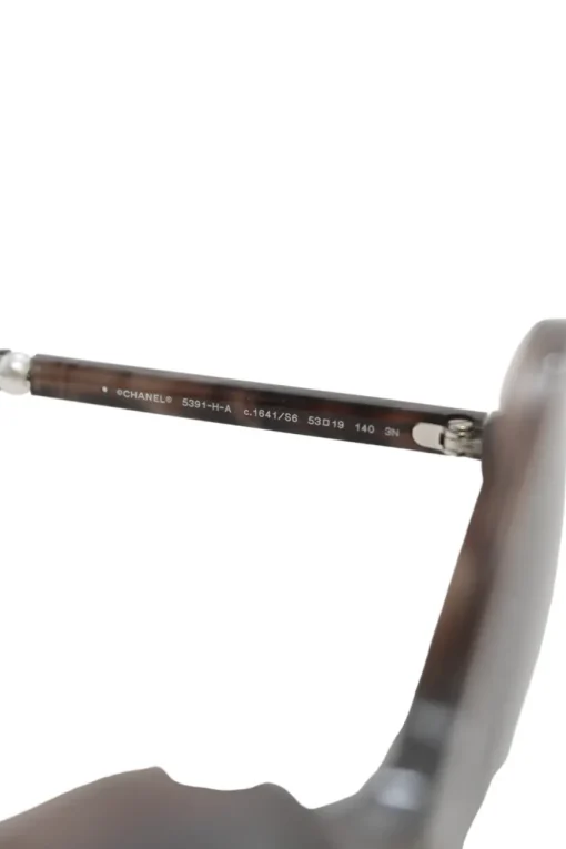 Brown tortoiseshell acetate and polycarbonate oversized round-eye sunglasses