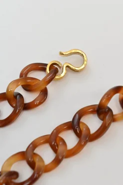 Brown tortoiseshell lucite chunky chain belt with Coco Mark heart and clover charms
