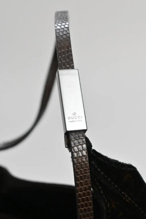 Brown velveteen mini shoulder bag with silver-tone metallic hardware and embossed leather strap