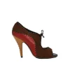 Brown whipstitch paneled leather open-toe booties with ankle tie fastening