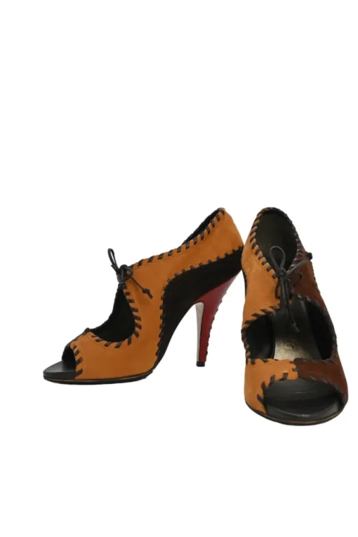 Brown whipstitch paneled leather open-toe booties with ankle tie fastening