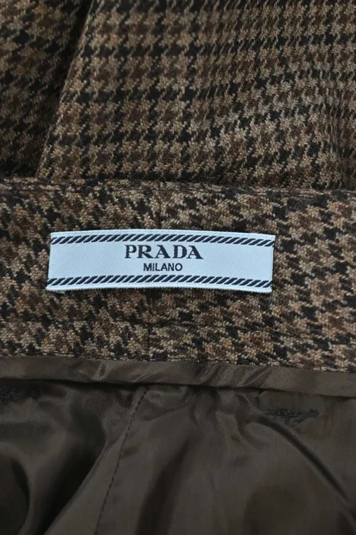 Brown wool houndstooth check tweed pull-on low-rise tapered leg tailored trousers with extended tab closure