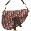 Burgundy and ecru Oblique monogram jacquard fabric and leather saddle bag with detachable shoulder strap