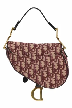 Burgundy and ecru Oblique monogram jacquard fabric and leather saddle bag with detachable shoulder strap
