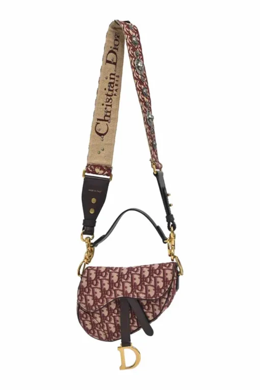 Burgundy and ecru Oblique monogram jacquard fabric and leather saddle bag with detachable shoulder strap