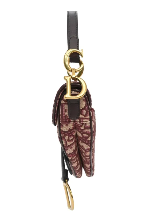 Burgundy and ecru Oblique monogram jacquard fabric and leather saddle bag with detachable shoulder strap