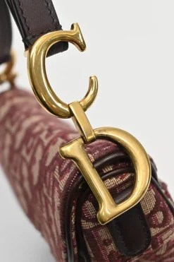 Burgundy and ecru Oblique monogram jacquard fabric and leather saddle bag with detachable shoulder strap