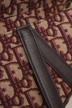 Burgundy and ecru Oblique monogram jacquard fabric and leather saddle bag with detachable shoulder strap