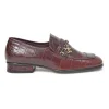 Burgundy croc-embossed leather slip-on loafers featuring chainlink Coco Mark charm vamp appliqué