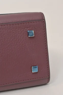 Burgundy grained leather Réjane PM top handle bag with detachable shoulder strap