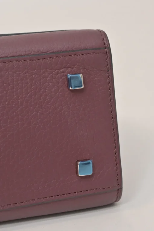 Burgundy grained leather Réjane PM top handle bag with detachable shoulder strap