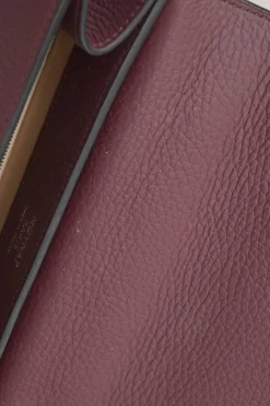Burgundy grained leather Réjane PM top handle bag with detachable shoulder strap