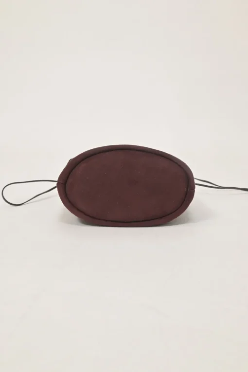 Burgundy grommet-embellished suede drawstring bucket pouch