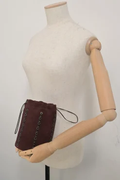 Burgundy grommet-embellished suede drawstring bucket pouch