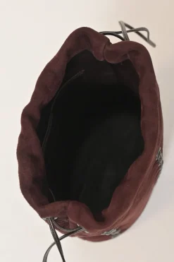 Burgundy grommet-embellished suede drawstring bucket pouch