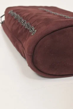Burgundy grommet-embellished suede drawstring bucket pouch