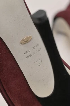 Burgundy paneled pull-on mid-calf heeled booties with scalloped edges