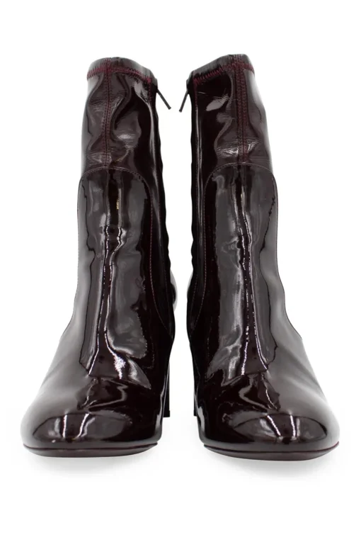 Burgundy patent leather ankle boots with floral pumps