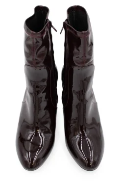 Burgundy patent leather ankle boots with floral pumps