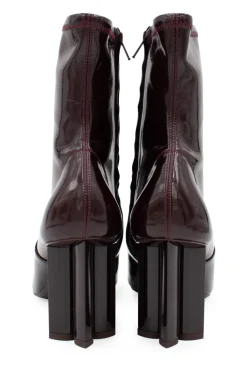 Burgundy patent leather ankle boots with floral pumps