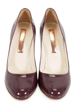 Burgundy patent leather high heeled pumps