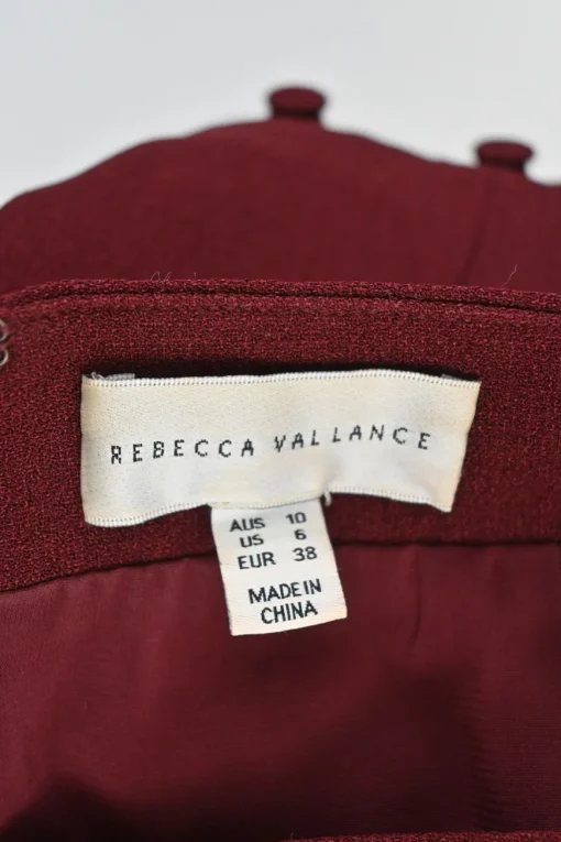 Burgundy polyester-blend Cortona concealed back zip fluted crepe midi skirt with fabric button accents on the flare