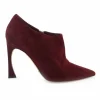 Burnt red suede and leather pointed toe zip-up comma heel ankle booties