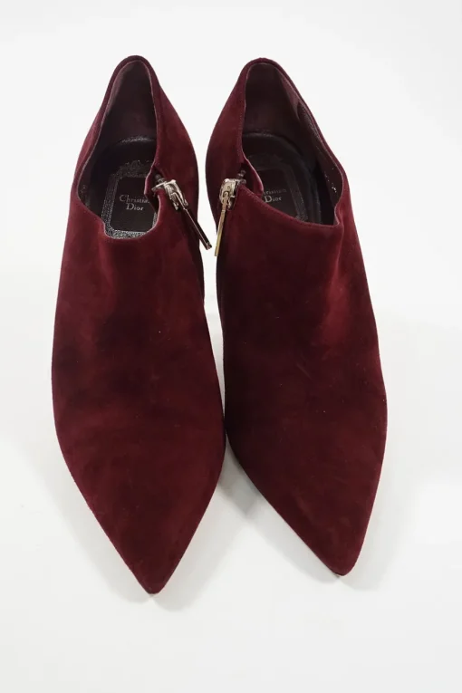 Burnt red suede and leather pointed toe zip-up comma heel ankle booties
