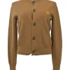 Camel wool button-front cardigan featuring signature leather face logo chest patch
