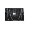Chanel Vertical Quilted 2.55 Bag in Black Leather. Circa 2011. 31 Rue Cambon Paris hardware. Mademoiselle lock and chain. Interior zip pocket and two slip pockets.