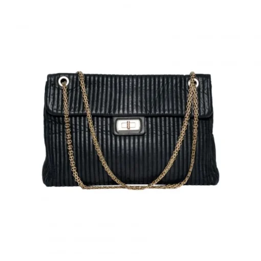 Chanel Vertical Quilted 2.55 Bag in Black Leather. Circa 2011. 31 Rue Cambon Paris hardware. Mademoiselle lock and chain. Interior zip pocket and two slip pockets.