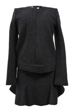 Charcoal merino melton three-piece set featuring collarless tailored jacket, strapless corset-style peplum top, and flounce mini skirt