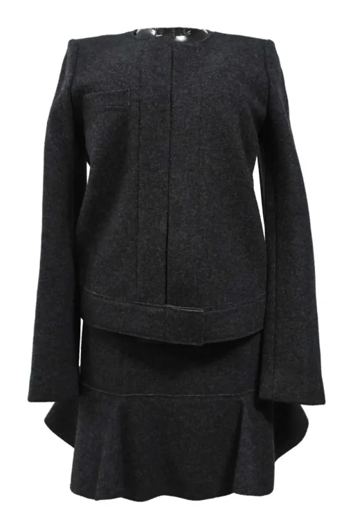 Charcoal merino melton three-piece set featuring collarless tailored jacket, strapless corset-style peplum top, and flounce mini skirt