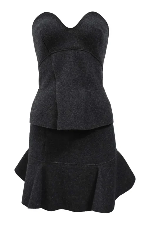 Charcoal merino melton three-piece set featuring collarless tailored jacket, strapless corset-style peplum top, and flounce mini skirt