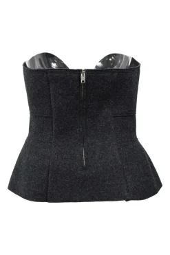 Charcoal merino melton three-piece set featuring collarless tailored jacket, strapless corset-style peplum top, and flounce mini skirt
