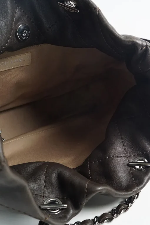 Classic quilted bronze leather shoulder bag with silver CC logo