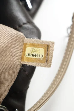 Classic quilted bronze leather shoulder bag with silver CC logo