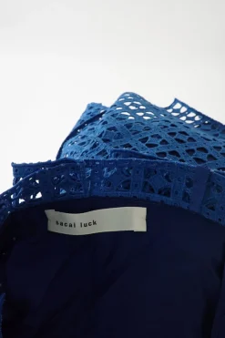 Cobalt blue cotton-blend broderie anglaise apron-style wrap-front mini peekaboo skirt