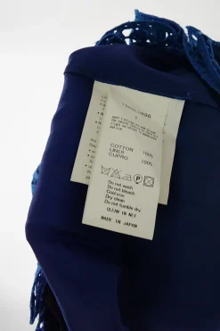 Cobalt blue cotton-blend broderie anglaise apron-style wrap-front mini peekaboo skirt