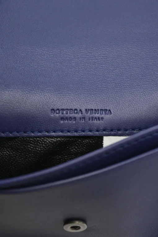Cobalt blue intrecciato nappa leather accordion wallet with concealed snap closure