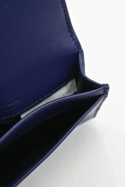 Cobalt blue intrecciato nappa leather accordion wallet with concealed snap closure