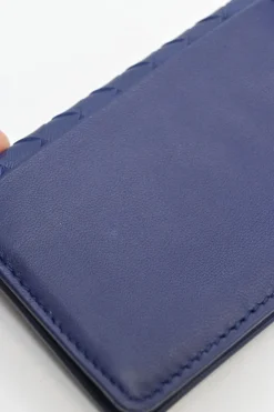 Cobalt blue intrecciato nappa leather accordion wallet with concealed snap closure