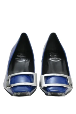 Cobalt blue patent leather limited-edition Trompette buckle pumps with mirrored signature comma heels