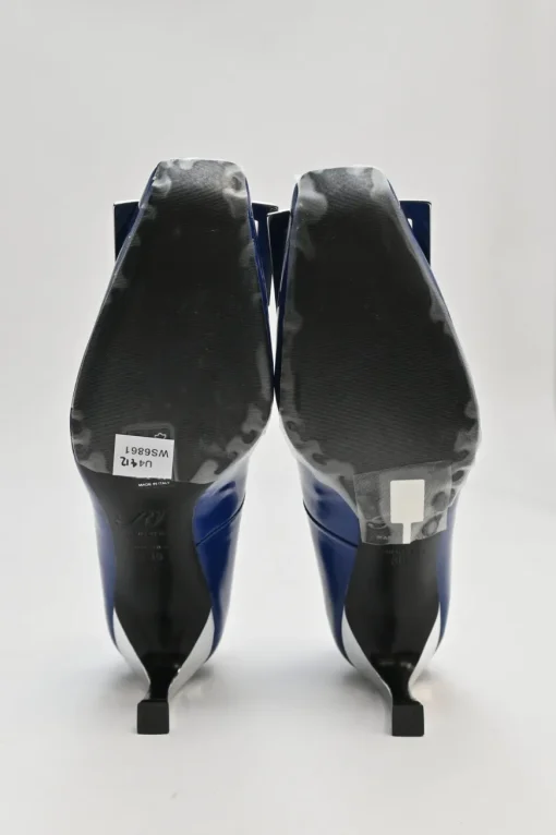 Cobalt blue patent leather limited-edition Trompette buckle pumps with mirrored signature comma heels