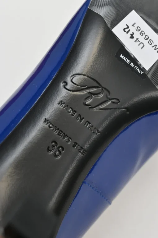 Cobalt blue patent leather limited-edition Trompette buckle pumps with mirrored signature comma heels