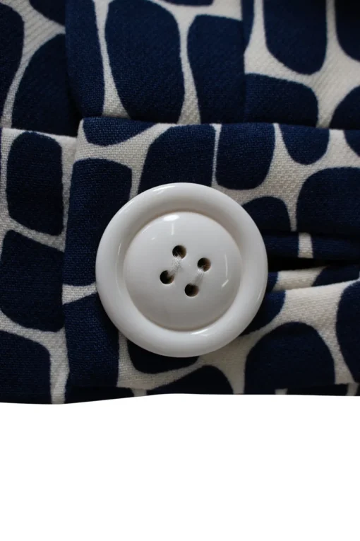 Cobalt blue wool trompe l'oeil croc print a-line skirt with two large buttons at waistline